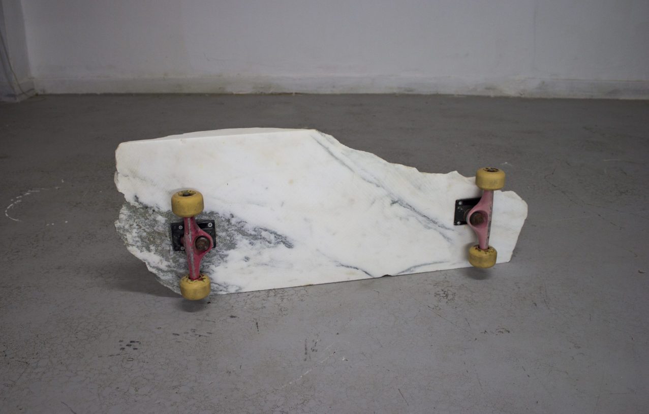 Anestis Ioannou, <i>New Sun I</i>, 2019, skateboard trucks and wheels on marble, <br>84x31x13 cm