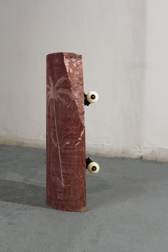 Anestis Ioannou, <i>New Sun (Fast as hell, red)</i>, 2022, skateboard trucks and wheels on marble, 70x28x23 cm