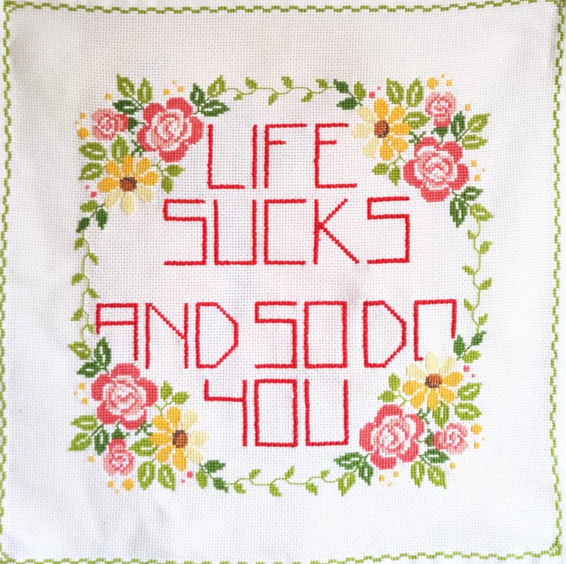 Denys Shantar, <i>Life sucks and so do you</i>, 2022, embroidery on found fabric, 60x60 cm