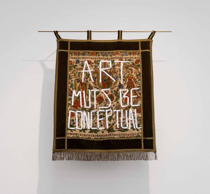 Denys Shantar, <i>Art must be conceptual</i>, 2021, applique on found fabric, 100x70 cm
