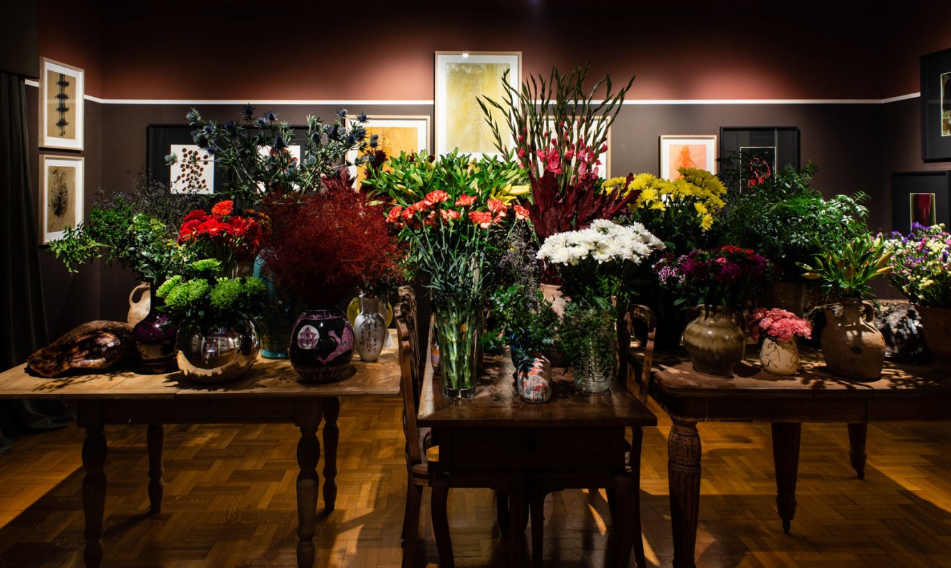 Stavros Papagiannis, <i>Untitled</i>, 2020, installation consisting of antique tables, antique chairs, tortoise shells and a large collection of vases full of fresh flowers and greenery
